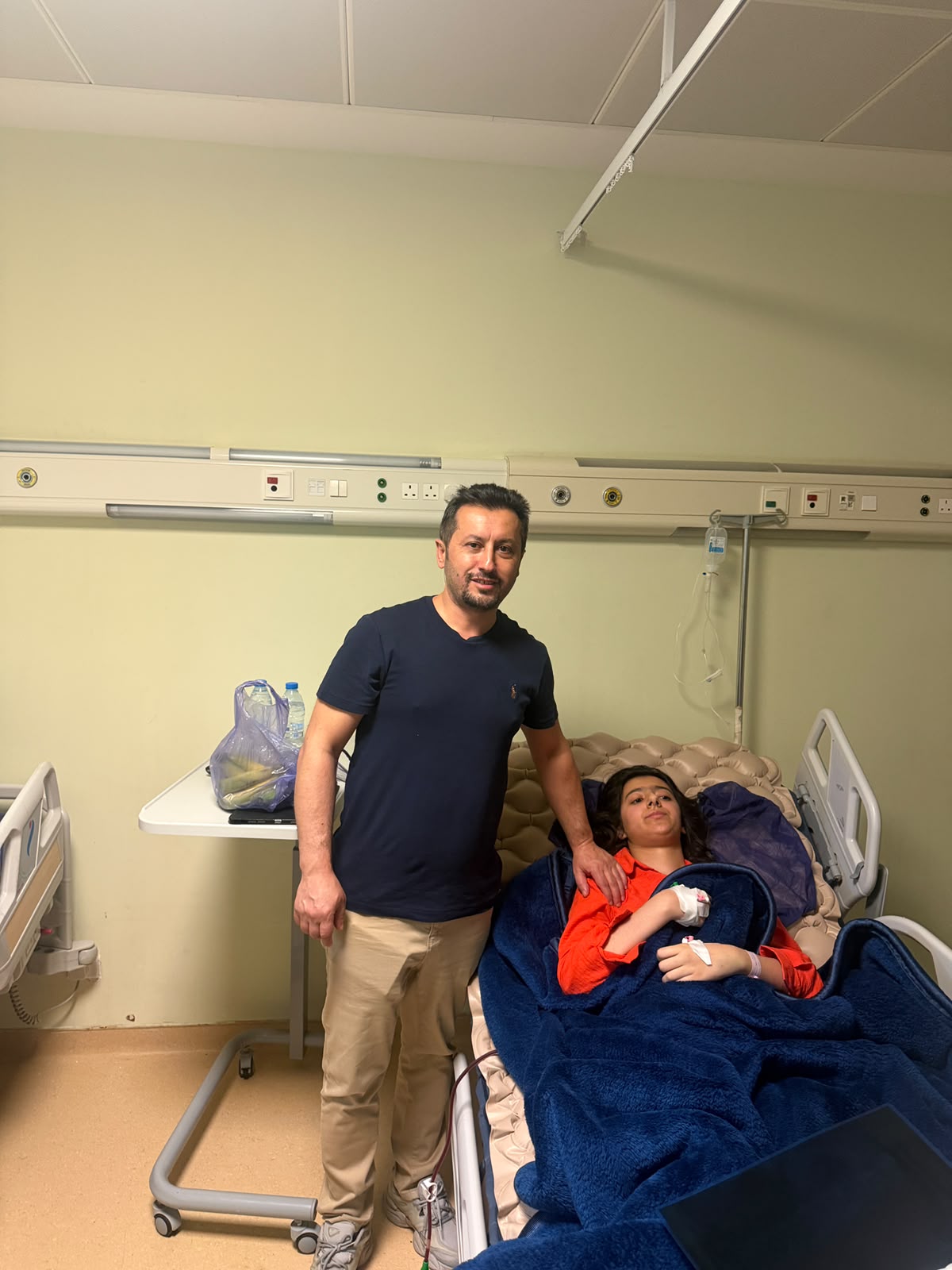 Post-operative visit with a young cardiac patient.